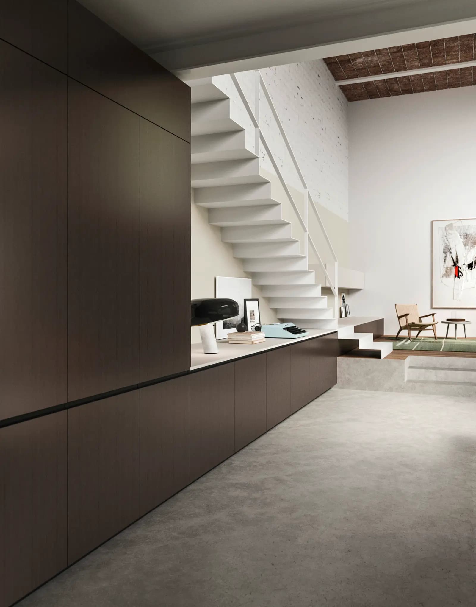 Longue file de meubles Snaidero Folio bruns, dans un loft traversé par un escalier