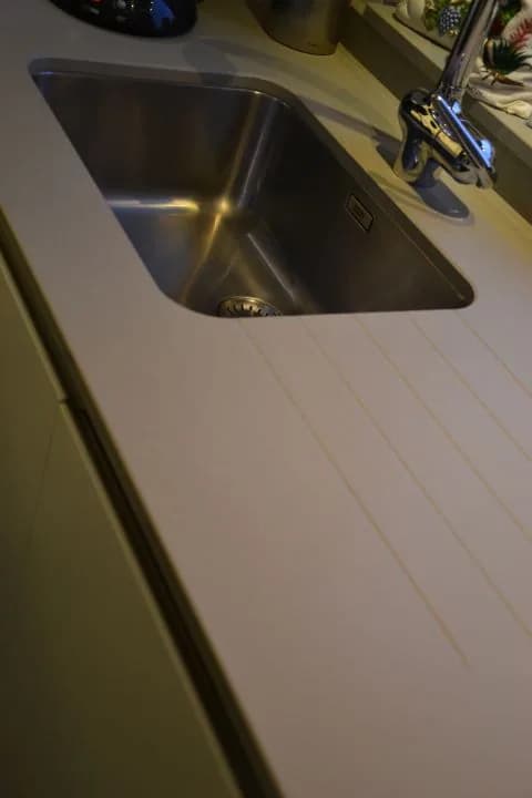 Cuisine ivoire aux lignes courbes, photo 7 sur 17